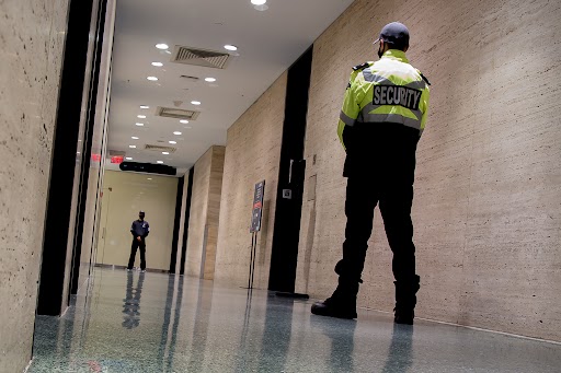 security personnel in a hallway